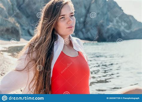 Young Woman In Red Bikini On Beach Girl Lying On Pebble Beach And Enjoying Sun Happy Lady With
