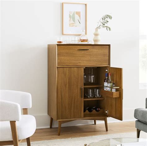These cabinets can display your tv and offer storage with cabinets and drawers. Mid-Century Bar Cabinet - Acorn | West Elm in 2020 | Mid ...