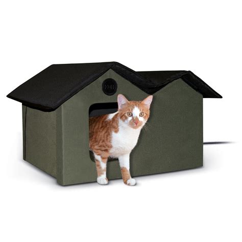 Automatic cat feeders can be programmed to serve food at set times and in set quantities. K&H Olive and Black Outdoor Heated Cat House | Petco