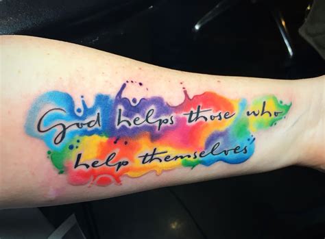 A Person With A Colorful Tattoo On Their Arm That Says God Help You