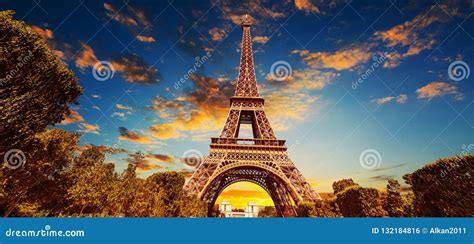 World Famous Eiffel Tower Under A Colorful Sky At Sunset Stock Photo