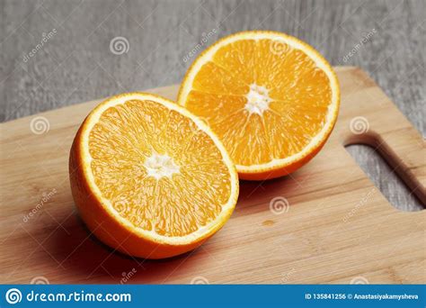 An Orange Cut Into Two Halves Stock Photo Image Of Food Diet 135841256