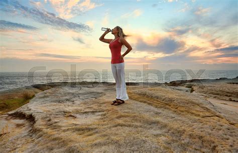 Woman Drinking Bottled Water Outdoors Stock Image Colourbox