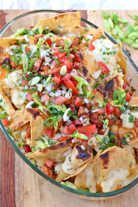Top with the lettuce, salsa, sour cream, guacamole, cilantro and pickled jalapenos. Dad's Chicken Nachos (AKA Chichen Nachos) | Perpetually Hungry