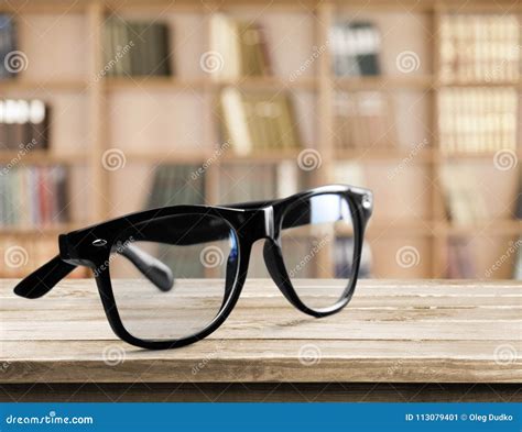 Single Eyeglasses Isolated On Wooden Background Stock Image Image Of Blue Medical 113079401