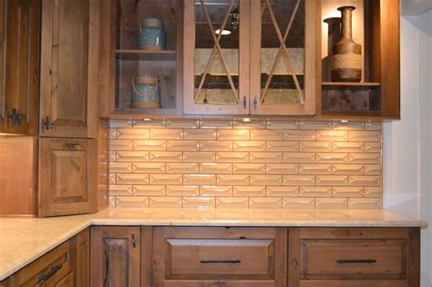 The main challenge in this kitchen was installing the huge center piece. Taj Mahal Quartzite matched with Stoneware Malt Subway ...