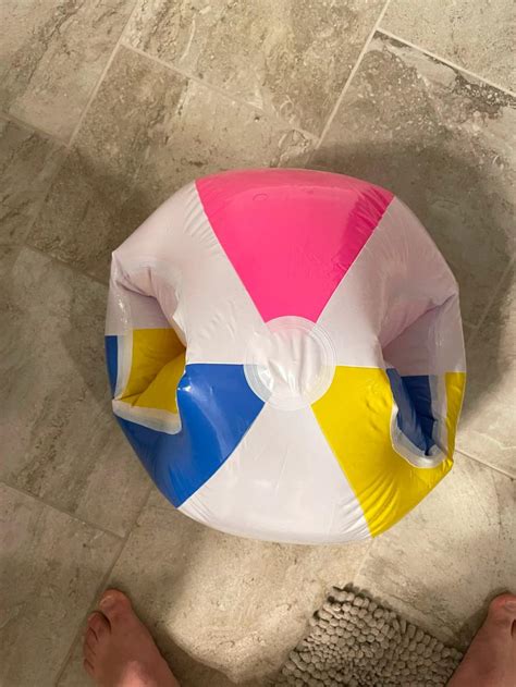 this inflatable beach ball swimsuit is sure to get some looks at the beach this summer