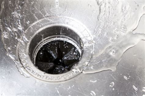 However, my contractor is very he plumbed the drain line to the right side of the cabinet right behind where the drain is. How to Clean a Garbage Disposal