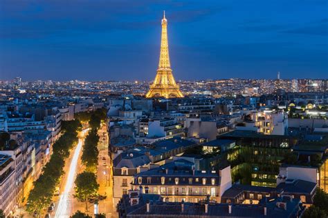 View Of The The Eiffel Tower And The Paris City Skyline Into The