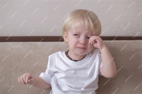 Premium Photo | The child cries tears flow from the eyes disappointment