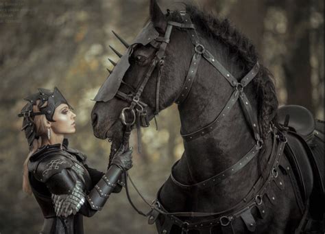 Friesian Warhorse And Warrior Dressed In Fantasy Battle Armor