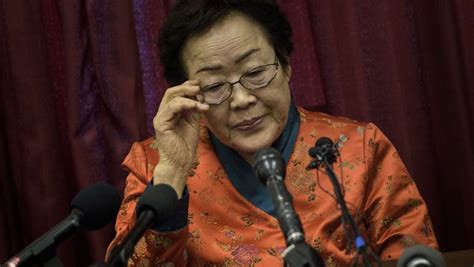 Lee Yong Soo Pauses During A News Conference By The Washington