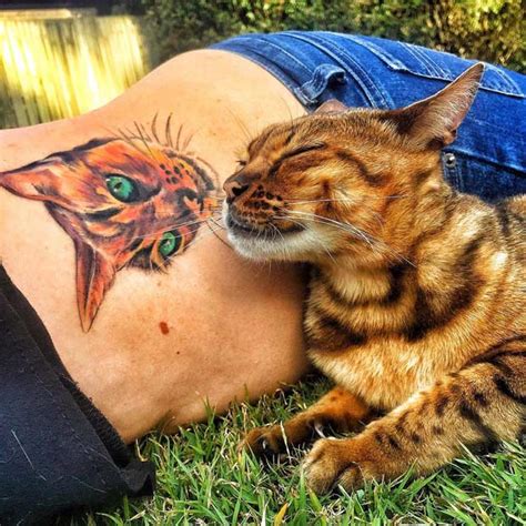 That sounds like a bengal cat to us! These Bengal Cat Tattoos Are Purrfection