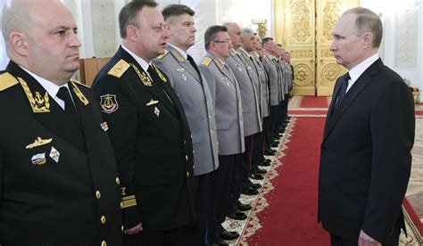 Russian President Vladimir Putin Right Meets With Senior Military