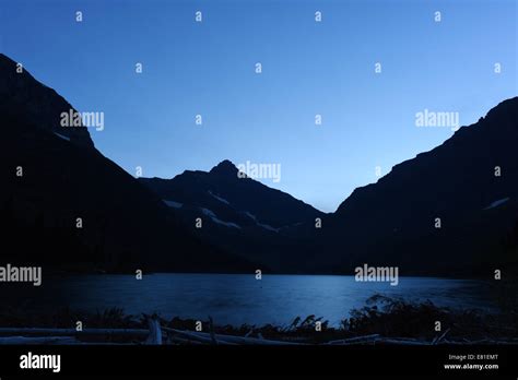 Dusk At Upper Two Medicine Lake In Glacier National Park Montana Usa