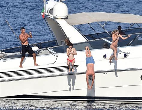 Formula Ones Eddie Irvine Seen On Portofino Yacht With Topless Women