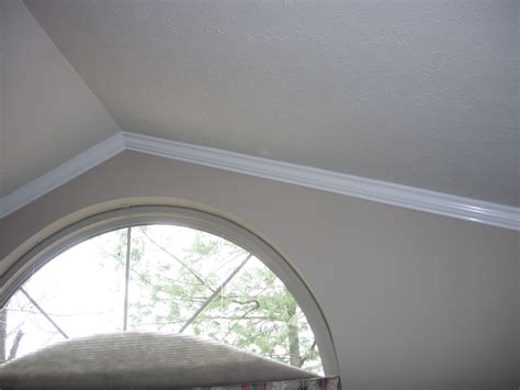 If replacement, how old is the existing fixture? Finish Carpentry & Mouldings | Crown molding vaulted ceiling, Basement remodeling, Cathedral ceiling