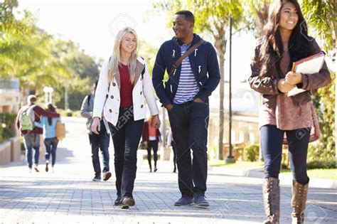 31050663 Students Walking Outdoors On University Campus Stock Photo