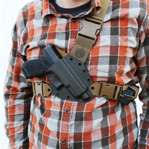 Gunfightersinc Introduces Gen2 Kenai Chest Holsters Jerking The Trigger