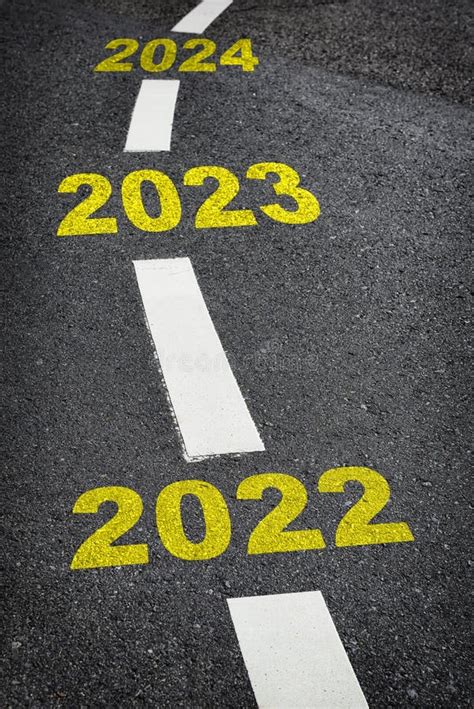 New Year 2022 2023 And 2024 Written On Country Road With Tree Tunnel