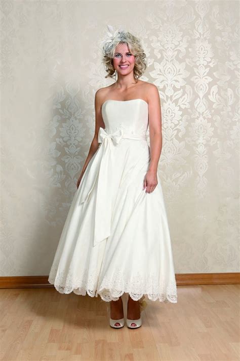 The most formal dress of them all. Alice Calf Length Ivory Silk Strapless Short Wedding Gown