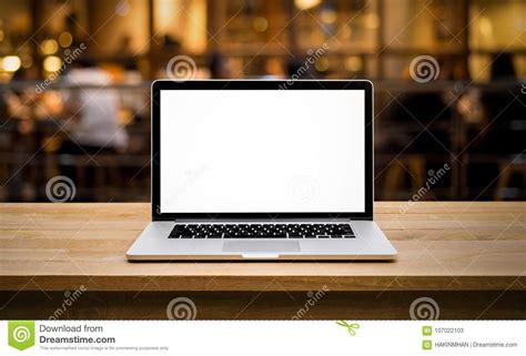 Modern Computerlaptop With Blank Screen On Table With Blur Cafe Stock