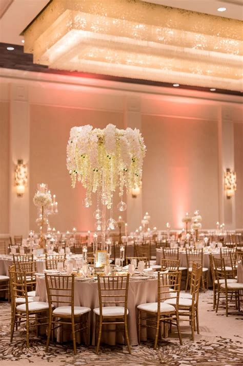 Hanging Flower Tall Wedding Centerpiece With White Orchids And Wisteria Gold Ballroom Wedding