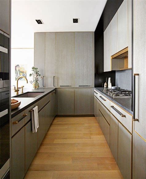 Discover inspiration for your small modern kitchen remodel or upgrade with ideas for storage, organization stunning grey on grey kitchen renovation. Step Inside a Glamorous Modern Apartment on NYC's High ...