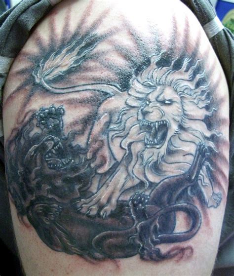 Https://wstravely.com/tattoo/fighting Lion Tattoo Designs