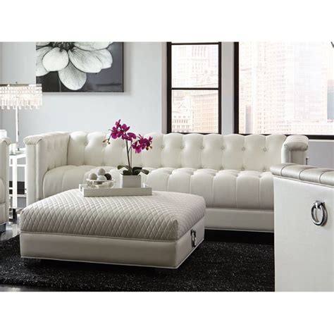 Premium velvet upholstery with cushioned fabric welcomes the classy napper after a long day of work. Coaster Chaviano Tufted Faux Leather Sofa in White - 505391
