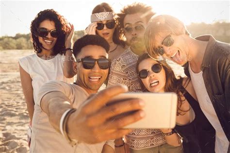 Multiracial Group Of Friends Taking Selfie By Vadymvdrobot Multiracial Group Of Friends Taking