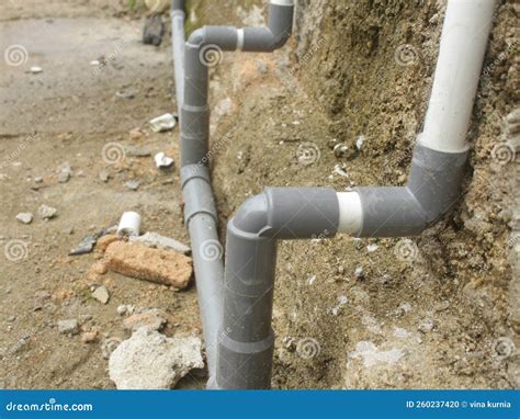 Pvc Water Piping Tube Installed Externally Along The Wall To Supply Water Stock Photography