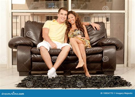 Couple Relaxing On Couch Stock Photo Image Of Attractive 10854770
