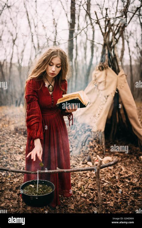 Young Witch In Autumn Forest Hi Res Stock Photography And Images Alamy