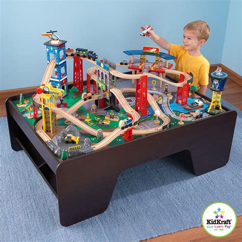 Hape e3766 70 piece railway train table and set toy with battery powered locomotive with removable playmat surface and storage for kids 3 years and up. Shopping for the holidays at Costco makes those larger ...