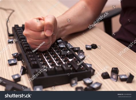 Man Smashes Mechanical Computer Keyboard Rage Stock Photo 550489600
