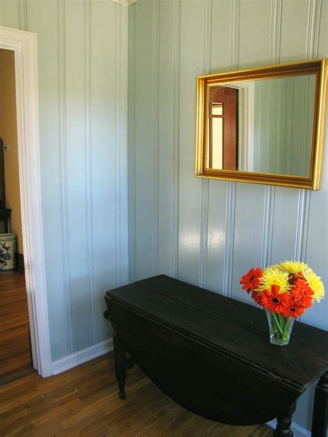 Primed paint covering over old wood is just not a good look. dulcious: woodlawn blue foyer | Knotty pine walls, Home, Pine walls