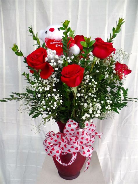 Maybe you would like to learn more about one of these? Red Vase of a Dozen Roses384760 | Serenity Flowers & Gifts