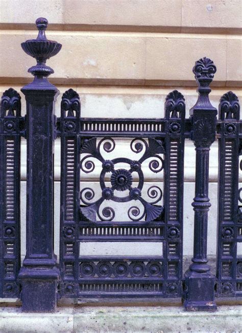 Iron rails supported by a wall or a ground base will become a wonderful frame for wooden balusters cut in any design ideas you have. Paint Colors for Iron Gates and Fences - Gardenista