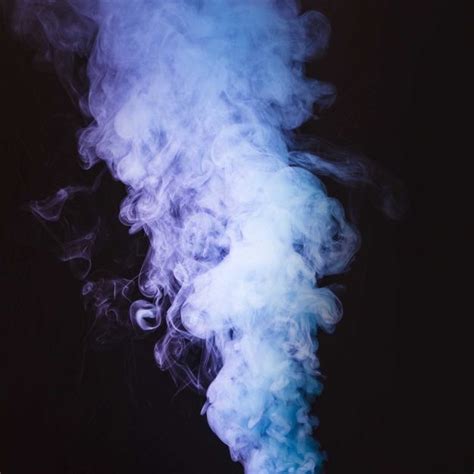 Download A Thick Twirling Smoke In Front Of Black Background For Free