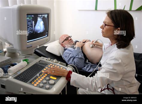 Ultrasound Scanning Of A Male Patient Medical Practice In A Doctors