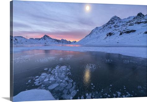 Ice Bubbles Frame The Frozen Lago Bianco At Dawn Engadine Switzerland