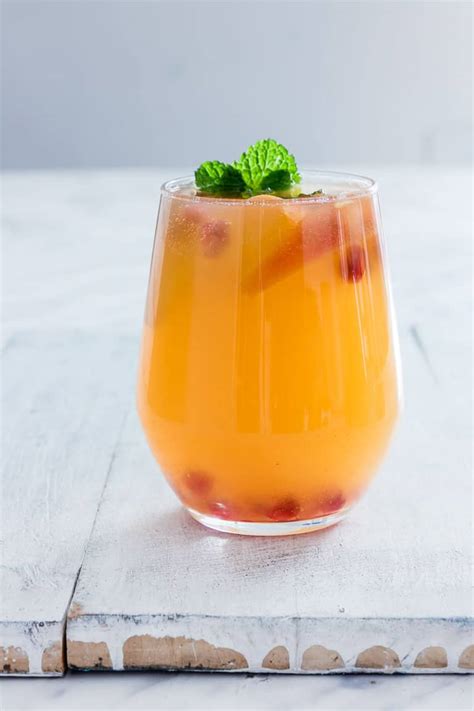 A bellini cocktail is a classic mix of sparkling wine and peaches, originally from the famous harry's bar in venice. Pomegranate Peach Bellini Recipe {Gluten-Free, Vegan, Low ...