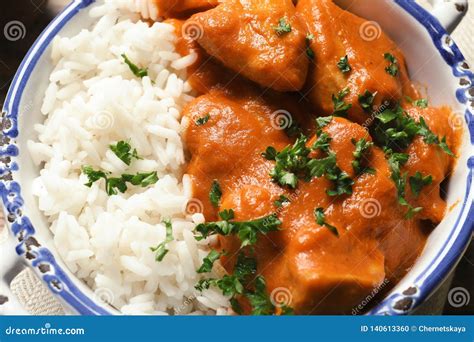 Delicious Butter Chicken With Rice In Bowl Stock Photo Image Of Grey
