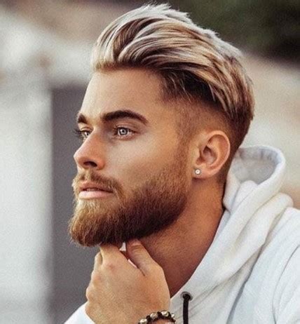 Slicked back undercut hairstyle for men. Best Men's Hairstyles of 2020 - Stylish New Haircuts for Guys
