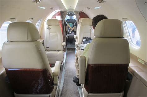 Maybe you would like to learn more about one of these? File:Embraer Phenom 300 cabin with passenger forward view ...