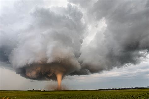 United States Of America A Tornado Churns Up Dust In The Sunset Light