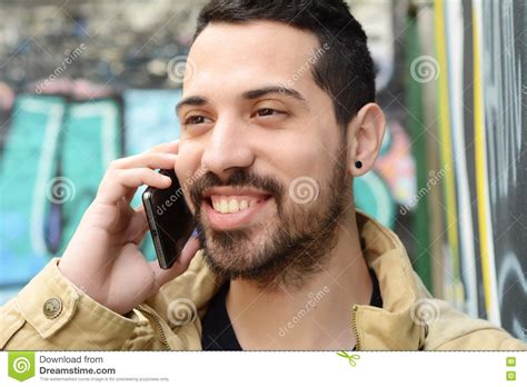 Young Latin Man Talking On The Phone Stock Photo Image Of Employee