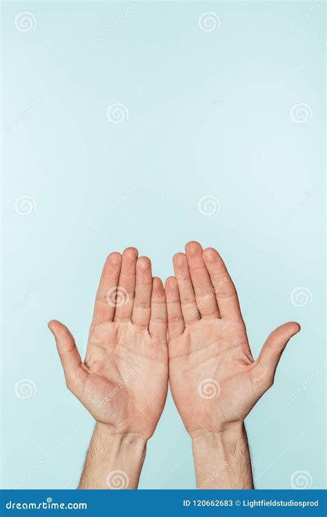 Cropped Image Of Man Showing Open Palms Stock Image Image Of Blue