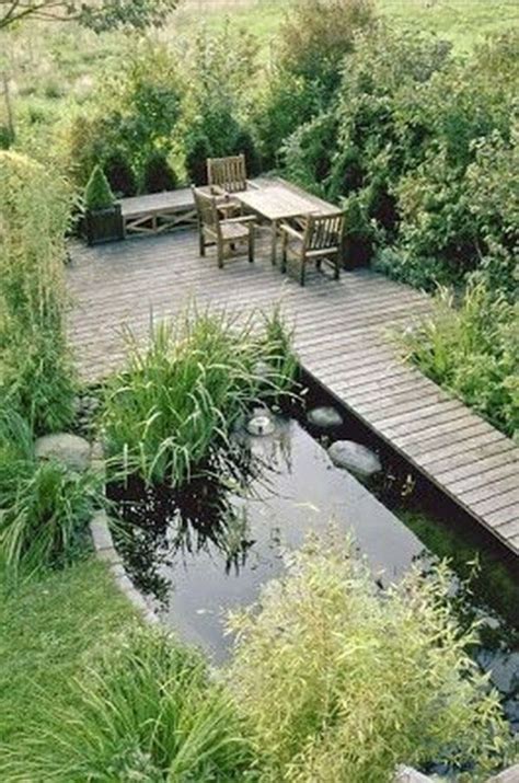 42 Fish Pond Garden Designs With Water Fountain Concept